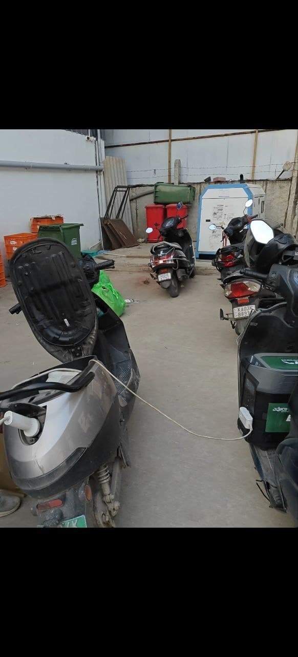 EVORA fleet operations — multiple EVs being serviced